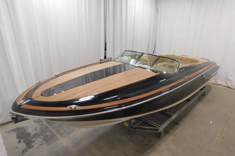 Slide: The Image of 2022 Chris-Craft Corsair 34 boat with sleek design and luxurious wood detailing. - 19