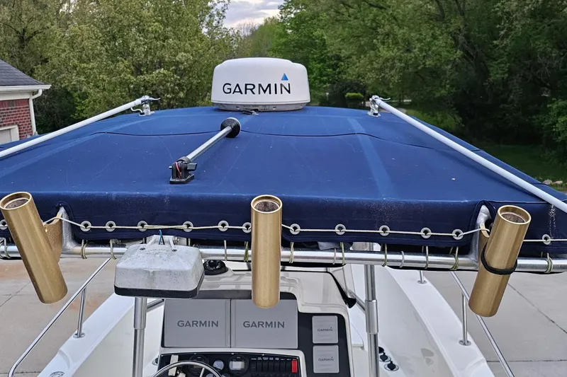 Slide: The Image of Boston Whaler 23 Outrage 1999 boat with Garmin equipment and rod holders. - 6