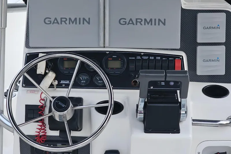 Slide: The Image of Control panel of a 1999 Boston Whaler 23 Outrage boat with Garmin electronics. - 7