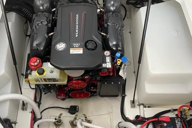 Slide: The Image of 2023 Cobalt R6 Surf boat engine compartment with Volvo Penta 360 V8 engine. - 14