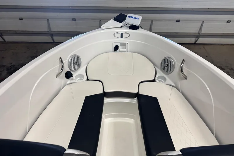Slide: The Image of Interior of 2023 Tahoe 200 S boat with seating and speakers. - 12