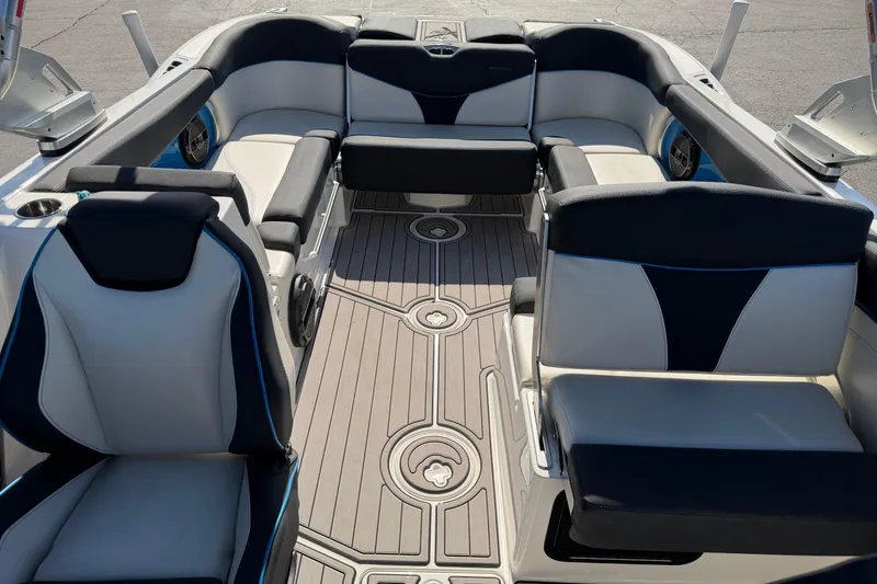 Slide: The Image of 2018 MasterCraft X26 boat interior with luxurious seating and modern design. - 15