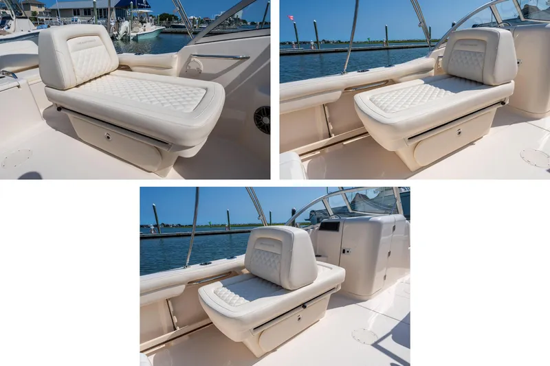 Slide: The Image of 2025 Grady-White Freedom 215 boat on water, showcasing sleek design and spacious interior. - 6