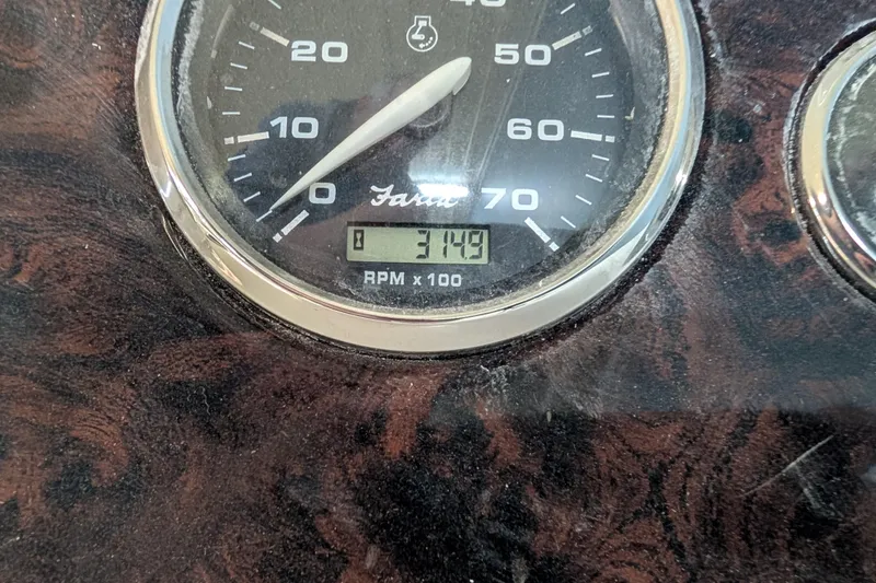 Slide: The Image of Tachometer of 2013 Hurricane SunDeck Sport 201 IO showing 3149 RPM. - 12