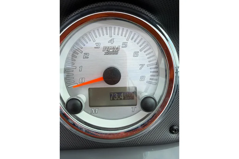 Slide: The Image of Tachometer of 2016 Yamaha Boats SX190 showing 73.4 engine hours. - 10