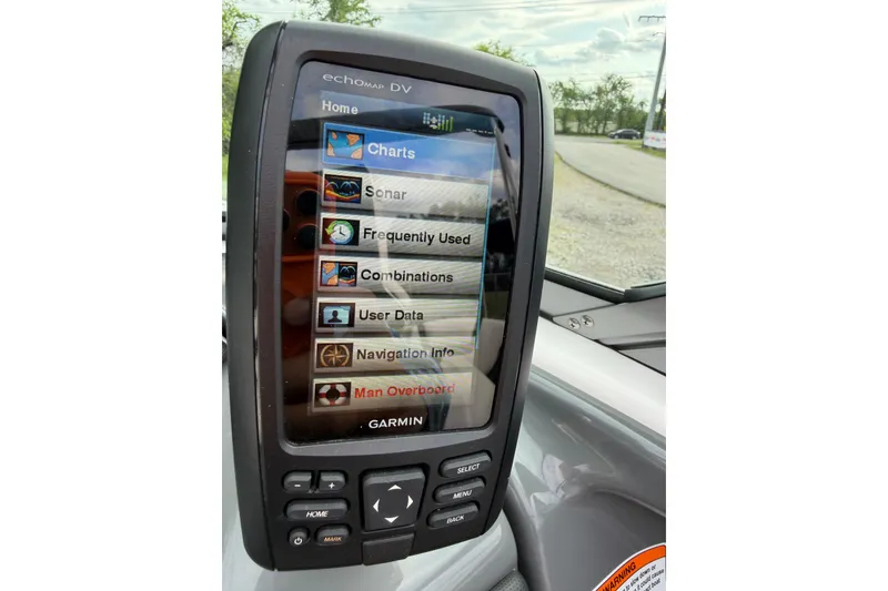 Slide: The Image of Garmin marine GPS display on 2016 Yamaha Boats SX190, showing navigation options. - 11