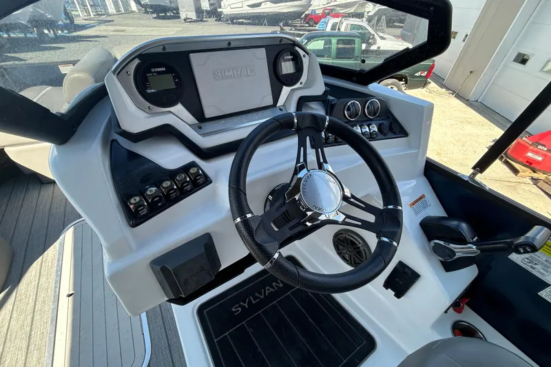 Slide: The Image of 2023 Sylva S3 boat dashboard with steering wheel and control panel. - 10