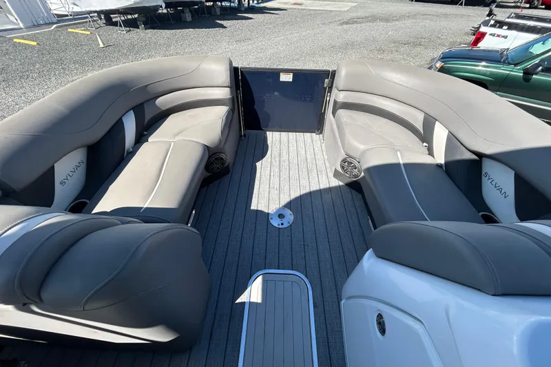 Slide: The Image of 2023 Sylva S3 boat interior with gray seating and spacious deck. - 13