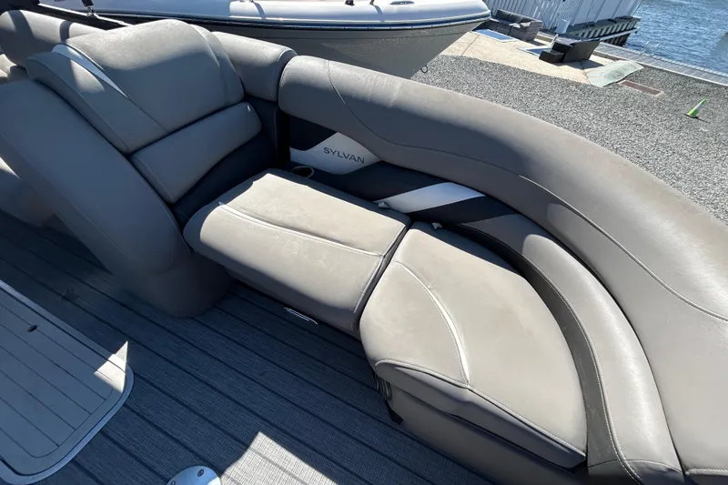 Slide: The Image of Luxurious seating on a 2023 Sylva S3 boat, featuring sleek gray upholstery. - 14