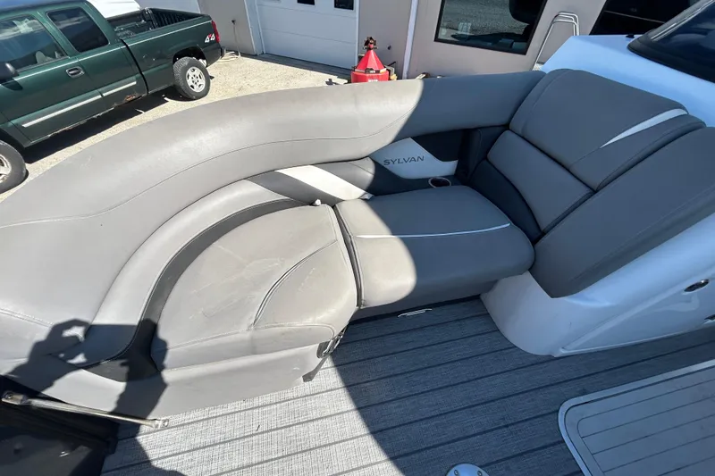 Slide: The Image of 2023 Sylva S3 boat with gray seating and cup holder on deck. - 15