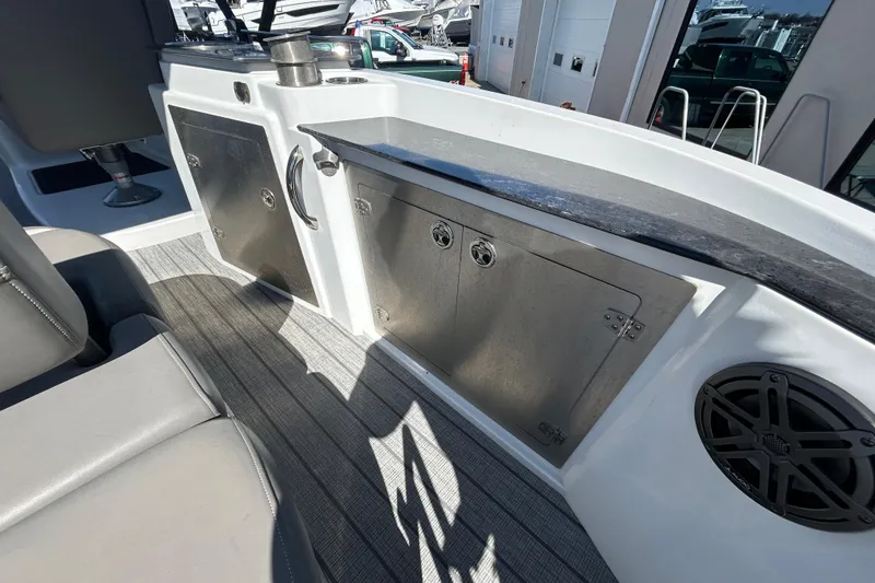 Slide: The Image of 2023 Sylva S3 boat interior with stainless steel storage and seating. - 7