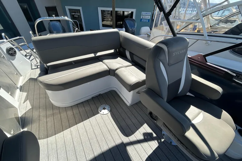 Slide: The Image of 2023 Sylva S3 boat interior with gray seating and modern design. - 8