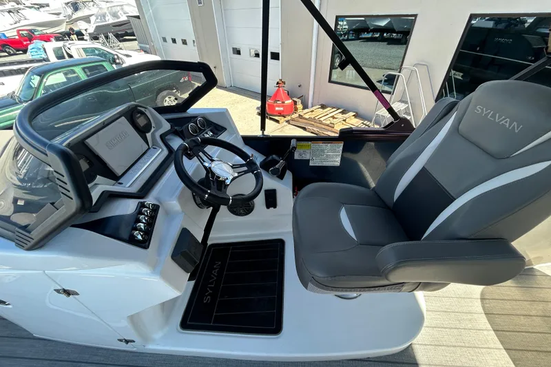 Slide: The Image of 2023 Sylva S3 boat cockpit with steering wheel and captain's chair. - 9