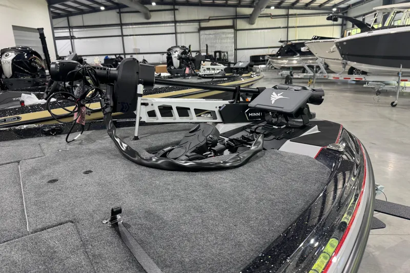 Slide: The Image of 2026 Skeeter ZXE20 boat interior with advanced fishing equipment in a showroom. - 3