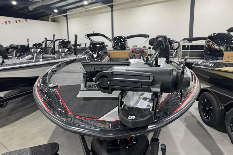 Slide: The Image of 2026 Skeeter ZXE20 boat displayed in showroom with advanced equipment. - 4