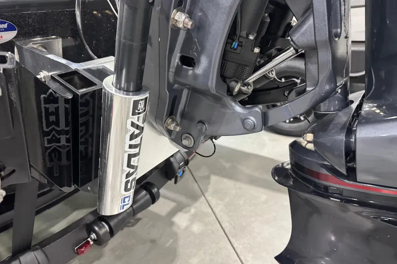 Slide: The Image of Close-up of 2026 Skeeter ZXE20 boat engine components and hydraulic system. - 7