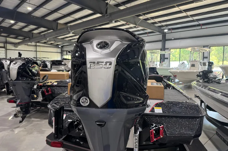 Slide: The Image of 2026 Skeeter ZXE20 boat in showroom with powerful 250 engine. - 8