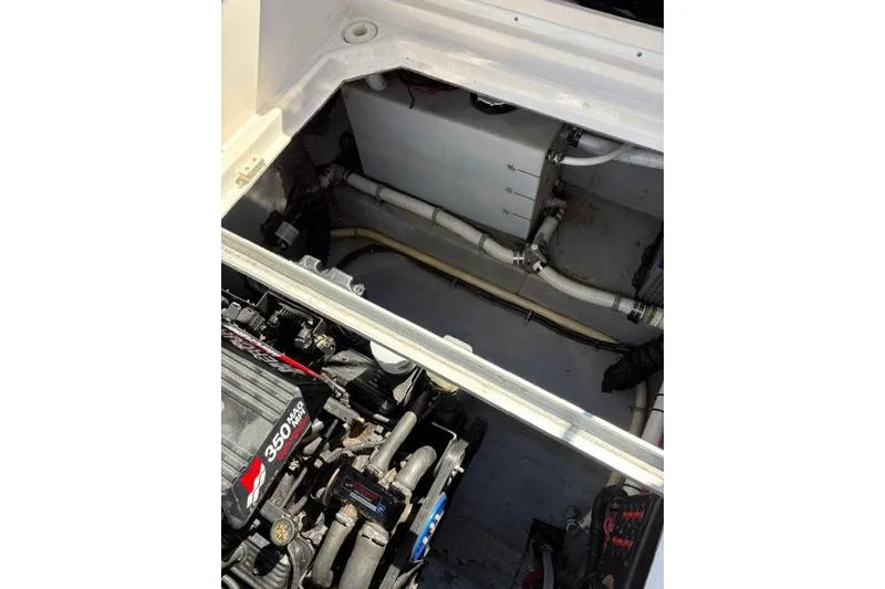 Slide: The Image of Interior of 2000 Chaparral Signature 270 boat with seating and table. - 10