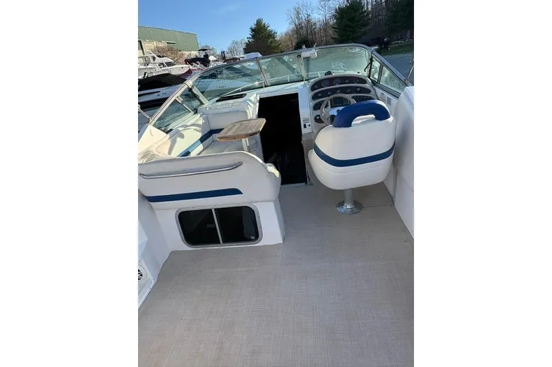 Slide: The Image of Interior of 2000 Chaparral Signature 270 boat with kitchenette, sink, and microwave. - 17