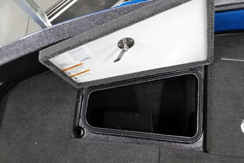 Slide: The Image of Open storage compartment in 2026 Ranger 1880MS A Pack Equipped boat. - 10