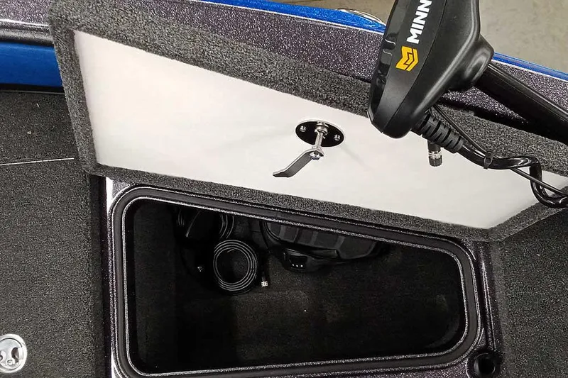 Slide: The Image of Open storage compartment in 2026 Ranger 1880MS A Pack Equipped boat. - 13