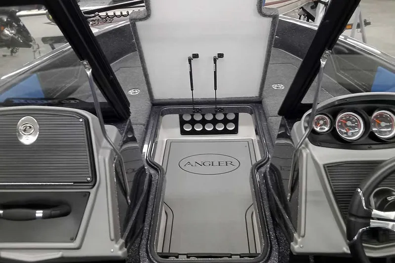 Slide: The Image of Interior view of 2026 Ranger 1880MS A Pack Equipped boat cockpit with control panels. - 14