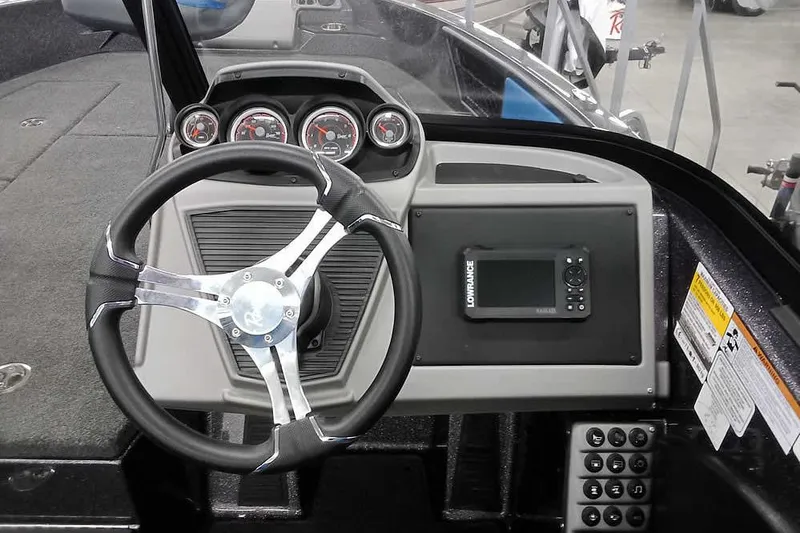 Slide: The Image of Steering console of 2026 Ranger 1880MS A Pack Equipped boat with gauges and Lowrance display. - 20