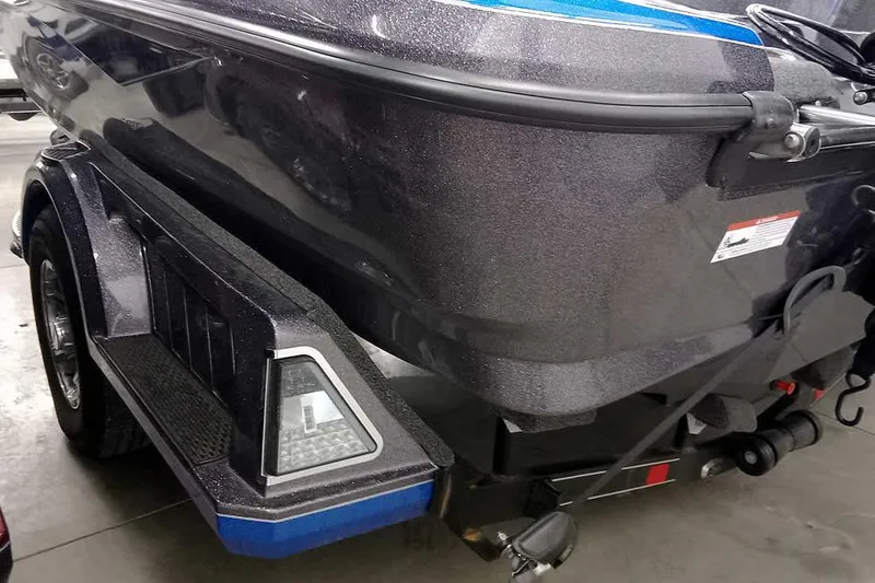 Slide: The Image of 2026 Ranger 1880MS A Pack Equipped boat on trailer, showcasing sleek design and detailing. - 7