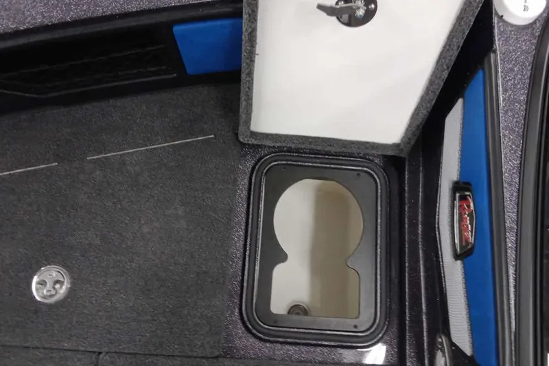 Slide: The Image of Open storage compartment in 2026 Ranger 1880MS A Pack Equipped boat interior. - 9