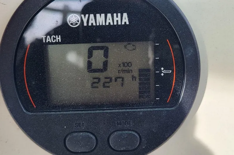 Slide: The Image of Yamaha tachometer displaying 227 hours on a 2019 Key West 244 Center Console boat. - 14