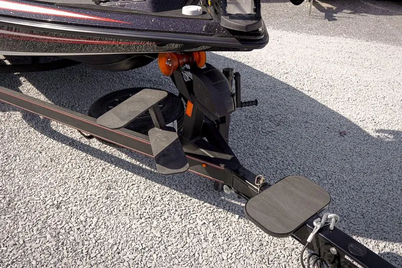 Slide: The Image of 2026 Skeeter ZX200 boat trailer hitch on gravel surface. - 11
