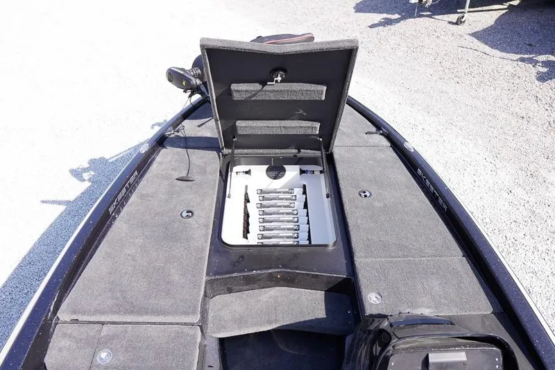 Slide: The Image of 2026 Skeeter ZX200 boat with open storage compartment on deck. - 22