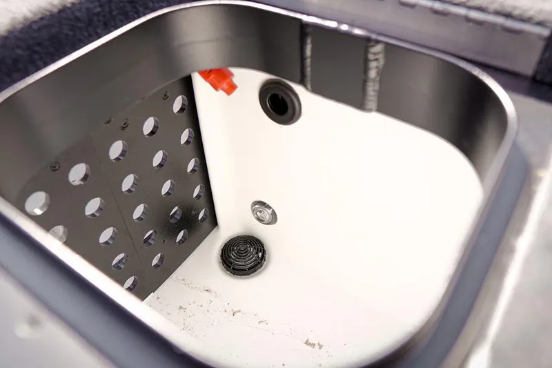 Slide: The Image of Livewell compartment of 2026 Skeeter ZX200 boat, featuring drainage and aeration system. - 31