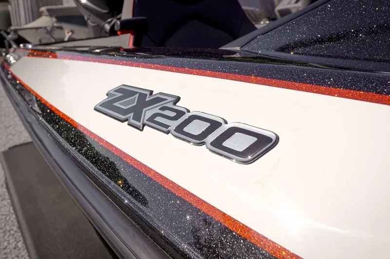Slide: The Image of 2026 Skeeter ZX200 boat with sleek design and metallic accents. - 35