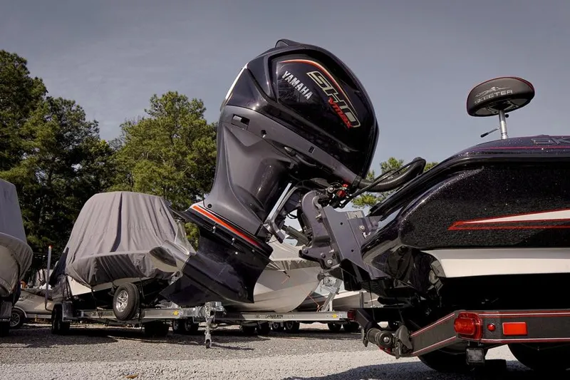 Slide: The Image of 2026 Skeeter ZX200 boat with Yamaha engine, parked outdoors on gravel. - 36