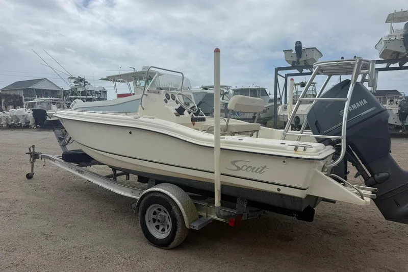 Slide: The Image of 2001 Scout 185 Sportfish boat on trailer with Yamaha outboard motor. - 3