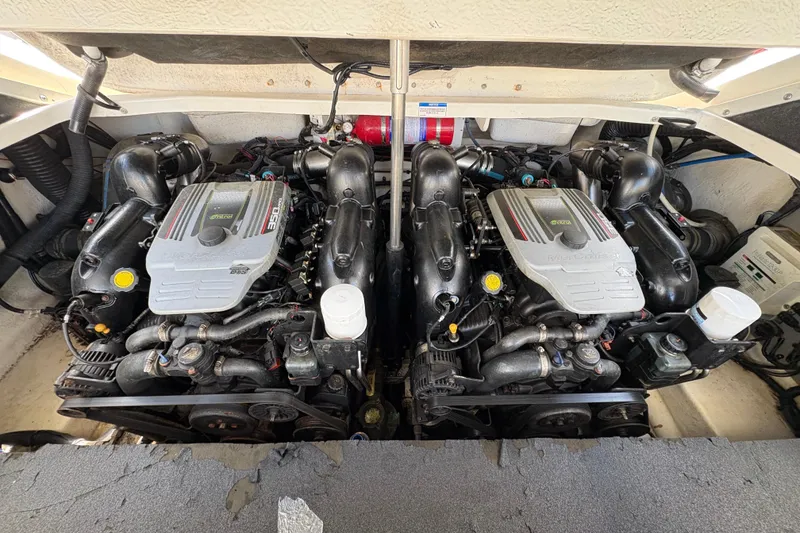 Slide: The Image of Twin engines in a 2015 Sea Ray 300 SLX boat, showcasing powerful marine engineering. - 21