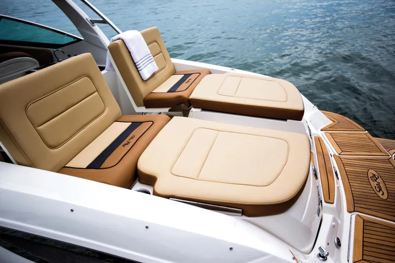 Slide: The Image of Manufacturer Provided Image: 2015 Sea Ray 300 SLX boat cruising with passengers on a lake. - 8