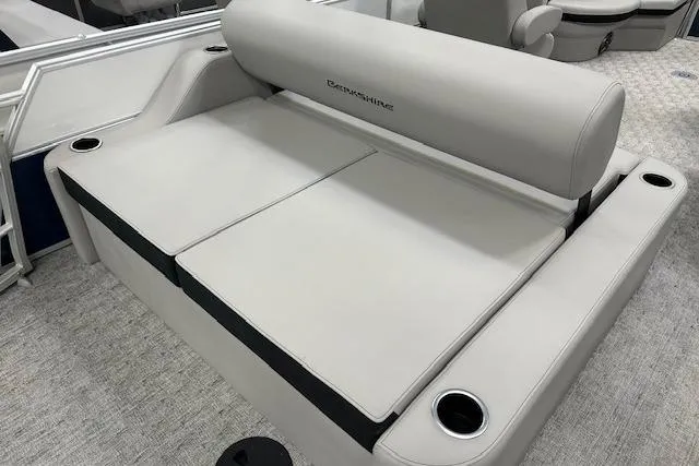 Slide: The Image of 2026 Berkshire 22UL LE B boat seating with cup holders and plush upholstery. - 3