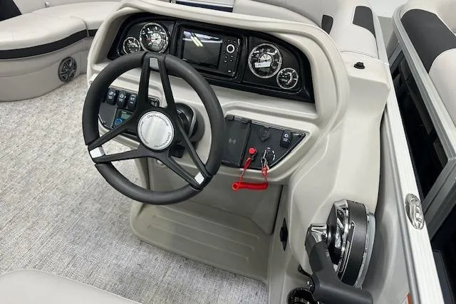 Slide: The Image of Cockpit of 2026 Berkshire 22UL LE B boat with steering wheel and control panel. - 4
