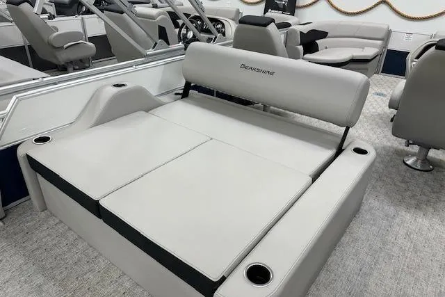 Slide: The Image of 2026 Berkshire 22UL LE B boat interior with plush seating and modern design. - 7