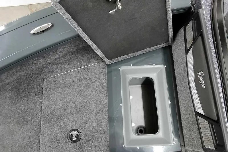 Slide: The Image of 2026 Ranger VX1888 WT boat interior storage compartment with open hatch. - 13