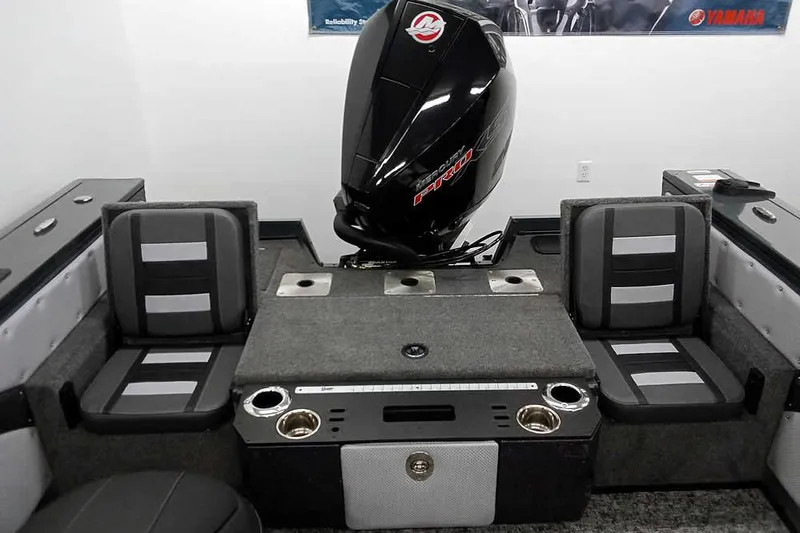 Slide: The Image of 2026 Ranger VX1888 WT boat interior with seating and motor, showcasing modern design. - 29