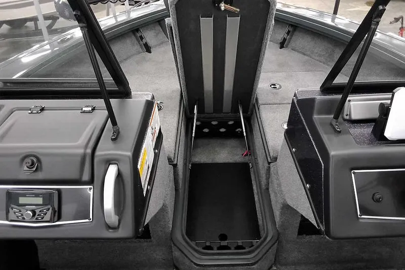 Slide: The Image of Interior view of 2026 Ranger VX1888 WT boat cockpit with storage compartments. - 8