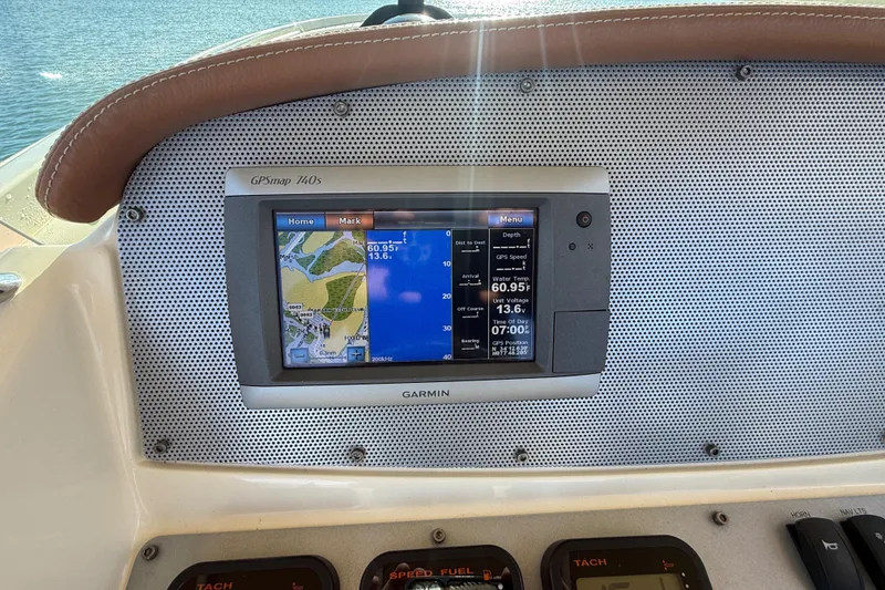 Slide: The Image of Garmin GPSmap 740s on 2013 Chris-Craft Catalina 26 boat dashboard. - 26