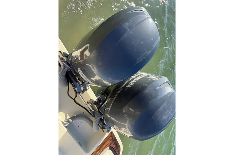 Slide: The Image of Twin Yamaha outboard engines on a 2013 Chris-Craft Catalina 26 boat. - 35