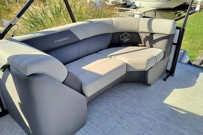 Slide: The Image of Luxurious seating on 2026 Viaggio V22U boat, featuring plush gray upholstery. - 10