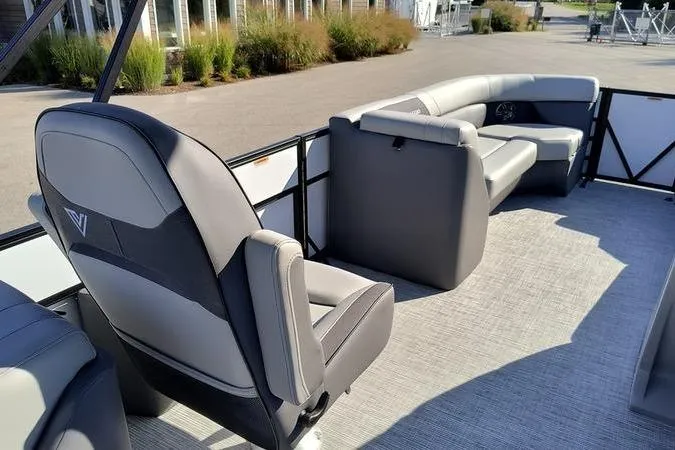Slide: The Image of Interior of 2026 Viaggio V22U boat with gray seating and modern design. - 11