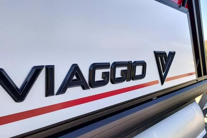 Slide: The Image of Close-up of 2026 Viaggio V22U logo on vehicle exterior. - 3