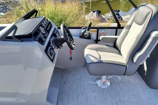 Slide: The Image of Captain's seat and helm of 2026 Viaggio V22U boat, featuring modern controls and comfortable seating. - 5